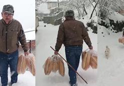 Yolu kar nedeniyle kapanan köyüne ekmek taşıdı