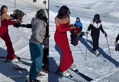 Kırmızı elbisesiyle Erciyes’te kayak yapıp, gül dağıttı