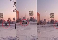 Otomobiliyle, üniversitenin basketbol sahasında kar üzerinde drift attı