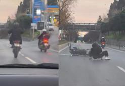 Üsküdar'da tek teker ilerlemeye çalışan motosikletli yola savruldu