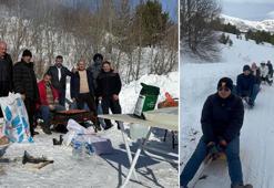 Kar üstünde piknik; mangal yakıp, otomobilin çektiği kızaklarla kaydılar