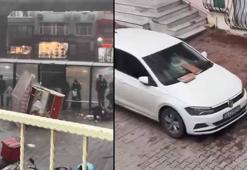 Fatih'te fırtınada inşaat iskelesi çöktü; çatıdan kopan kiremit parçaları aracın camını patlattı