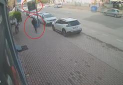 Fırtınada düşen tabelanın altında kalmaktan son anda kurtuldu