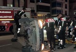 Park halindeki otomobile çarpıp takla atan araçta mahsur kaldı