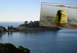 Kuşadası’nda deniz suyu çekildi; Roma dönemine ait mermer kaide ortaya çıktı