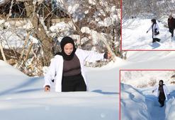 Ebe Aysel, 1,5 metre karda yürüyerek sağlık hizmeti veriyor