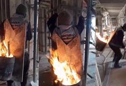 Dondurucu soğukta içerisinde ateş yanan tenekeyi sırtına alıp çalıştı