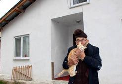 Yanan evinin önünde kedisine sarıldığı fotoğrafla tanınan Ali Meşe 93 yaşında öldü