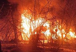 Yanan evinin 10 metre ilerisinde ağaçta asılı cansız bedeni bulundu
