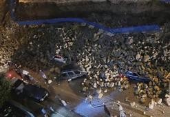 İstinat duvarının park halindeki araçların üstüne çöktüğü anlar kamerada