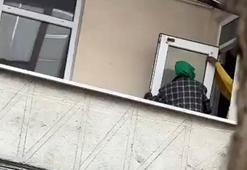 Esenyurt'ta binaya giren 2 kişi kapı ve pencereleri çaldı