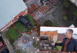 20 yıldır iş yerinin çatısında duran otomobili, akan çatıyı tamir etmek isteyince gördü