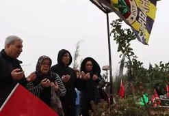 Fenerbahçe bayrakları asılan mezarlıkta ağabeyini andı; enkazdan boynunda takımının atkısıyla çıktı