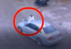 Otomobilin kaputunda yolcu taşıyan sürücüye ceza; o anlar kamerada