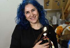 Evlat hasretini bez bebeklerle dindirdi