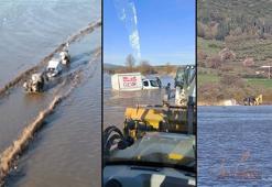 Derenin taşması ile yollar ve tarım arazilerini su bastı; mahsur kalan sürücü kurtarıldı