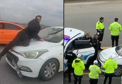 Sürücü kursu eğitmeni, tartıştığı kişiyi kaput üzerinde 20 kilometre sürükledi