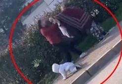 Bursa'da iki kadın dilencinin yanlarındaki bebeğe rağmen yer kavgası kamerada