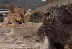 Amasya'da dağdan kopan dev kayalar yolu ulaşıma kapattı