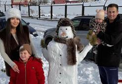 Kardan adam yapıp, başına kalpak taktılar