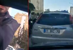 Adana'da trafikte tartıştıkları sürücünün önünü kesip, aracın camını yumrukladılar; o anlar kamerada