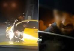 Taksici, içinde müşteri olan meslektaşının aracının önünü kesip, tehdit etti