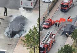 Alev alan elektrikli otomobile, yangın battaniyesi ile müdahale