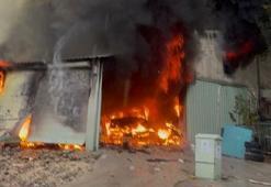 Antalya'da araç boyama atölyesindeki yangın, bitişikteki iş yerine sıçradı