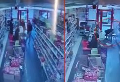 Jandarma personelinin, marketteki müşteriyi kalp masajıyla hayata bağladığı anlar kamerada