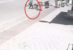 2 yaşındaki çocuğu, sokak ortasında tekmeledi