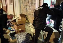 'Kadına şiddet' ihbarına giden polis, 3 milyon liralık kaçak ürün ele geçirdi; 2 gözaltı