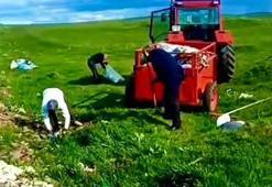 Kars’ta muhtarlar el ele verdi, köy girişlerindeki çöpleri temizledi