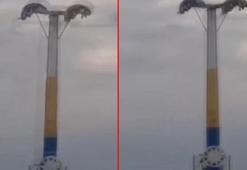 Lunaparkta arızalanan oyuncakta baş aşağı mahsur kaldılar