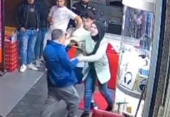 Esenyurt'ta kadın esnafa bıçak çekti, ayağı takılıp yere düştü: O anlar kamerada