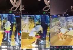 Mini etek giyip peruk takan erkek, mağazadan kilim çaldı; o anlar kamerada