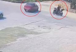 Otomobil ile çarpışan motosikletin sürücüsü yaralandı; kaza anı kamerada