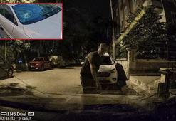 Komşusunun otomobiline tuğlayla zarar verdi, olay araç kamerasına yansıdı