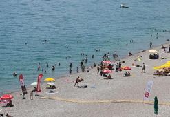 Antalya’da hava sıcaklığı 38 derece oldu, sahillerde yoğunluk yaşandı