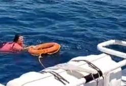 Kuşadası'nda akıntıyla açığa sürüklenen kadını deniz polisi kurtardı