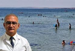 Doç.Dr.Doğan: Deniz ve havuzda kalınan sürenin artması, hastalık olasılığını artırır