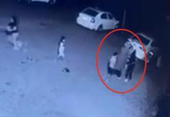 11 yaşındaki çocuğu site bahçesinde darbetti; olay kamerada