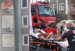 2 daireyi küle çeviren yangında mahsur kalan aile kurtarıldı