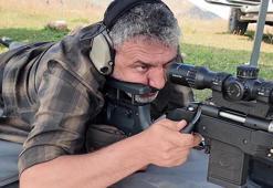 110 metreden yaptığı atışla 2 şişe arasına sıkıştırılan kağıt parçasını vurdu