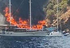 Fethiye’de koydaki tekne yandı, 115 yolcu suya atladı
