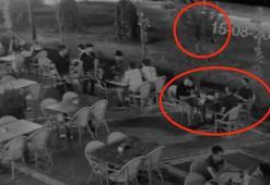 Ağacın arkasında pusuda bekleyip kafede oturan kişiyi vurdu