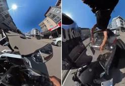 Otomobile çarpan motosikletin sürücüsü, metrelerce savruldu; kaza kask kamerasında