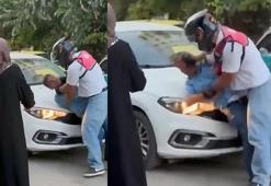 Yol verme tartışmasında motokurye, otomobil sürücüsünü kaputa yatırıp defalarca yumrukladı