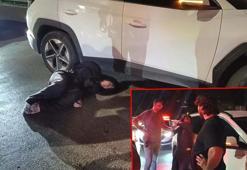 Otomobiliyle ters yöne giren sürücü polise direnip, gazetecilere tükürdü