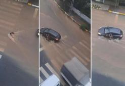 Sultanbeyli’de yağmur suyunda sürüklenerek yere düşen çocuğa sürücü yardım etti