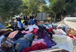 Avcılar'da bodrum katta biriktirilen kıyafetler ceza korkusuyla sokağa bırakıldı, çevredekiler kapıştı